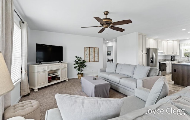 4755 Boulder Dr, Holland, MI 49423 - living area featuring ceiling fan, recessed lighting, and light colored carpet