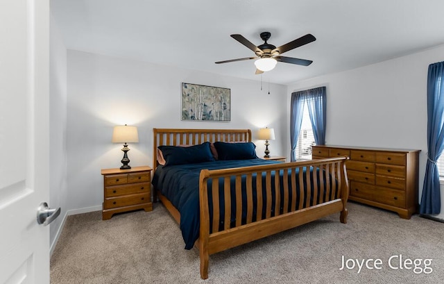 4755 Boulder Dr, Holland, MI 49423 - carpeted bedroom with baseboards and ceiling fan