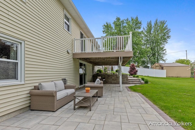 view of patio featuring outdoor lounge area and a wooden deck