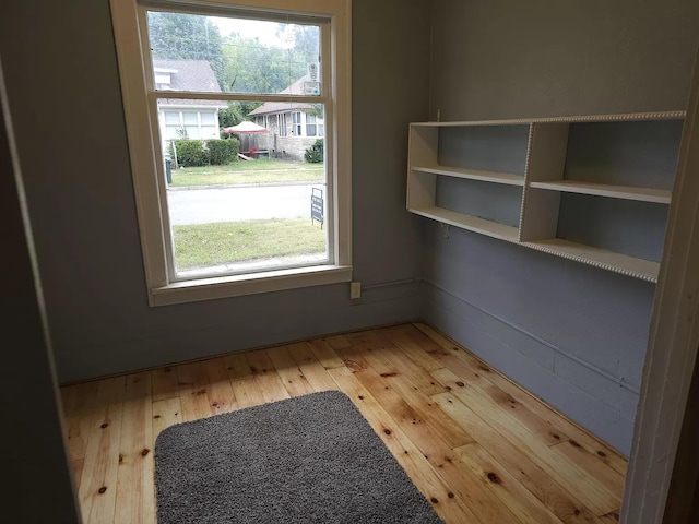 spare room featuring hardwood / wood-style flooring