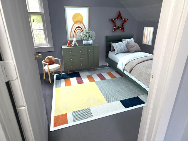 bedroom featuring lofted ceiling