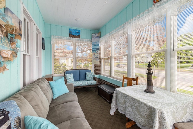 705.5 E Ludington Ave, Ludington, MI 49431 - sunroom / solarium with plenty of natural light and carpet