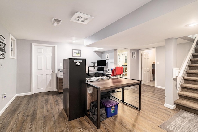 705.5 E Ludington Ave, Ludington, MI 49431 - office space featuring wood finished floors and baseboards