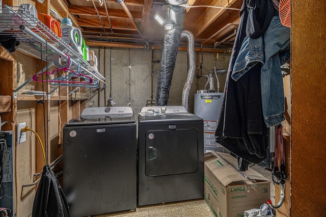 laundry room with washer and dryer and gas water heater