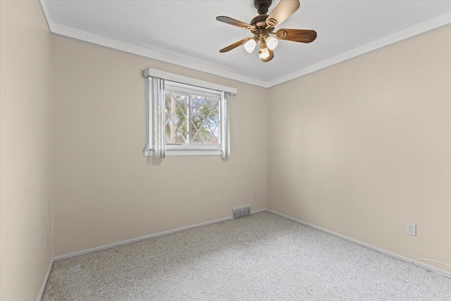 unfurnished room featuring carpet floors, a ceiling fan, ornamental molding, and baseboards
