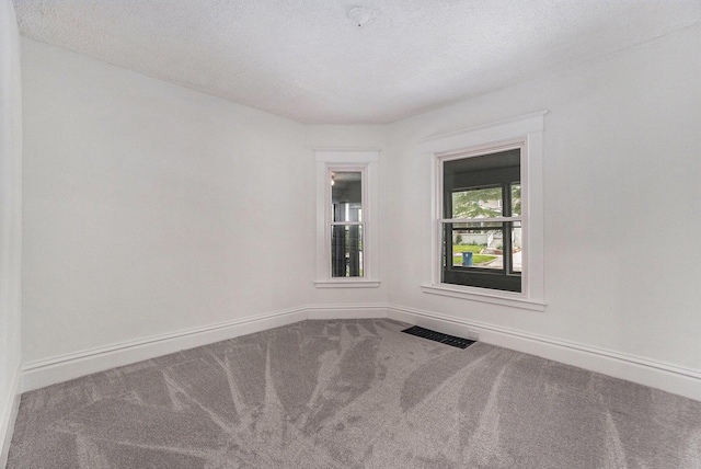 2145 Horton Ave SE, Grand Rapids, MI 49507 - carpeted spare room with baseboards