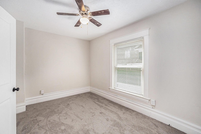 2145 Horton Ave SE, Grand Rapids, MI 49507 - unfurnished room with carpet floors, ceiling fan, and baseboards