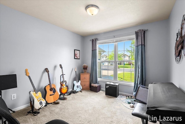game room with carpet and baseboards