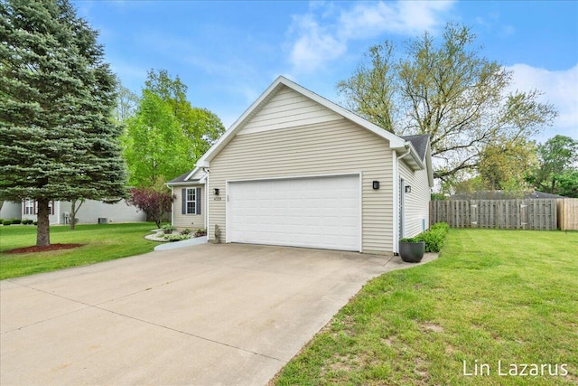 view of home's exterior featuring an attached garage and concrete driveway