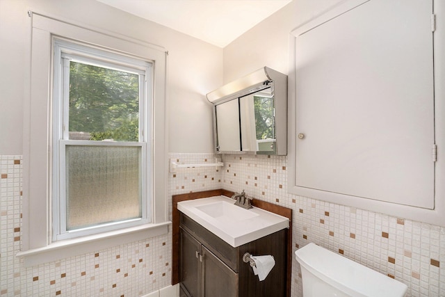 223 N Edison, Royal Oak, MI 48067 - bathroom with tile walls, vanity, toilet, and a wainscoted wall
