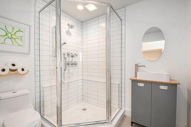 1950 Robinson Rd SE, East Grand Rapids, MI 49506 - full bathroom featuring toilet, a shower stall, and vanity