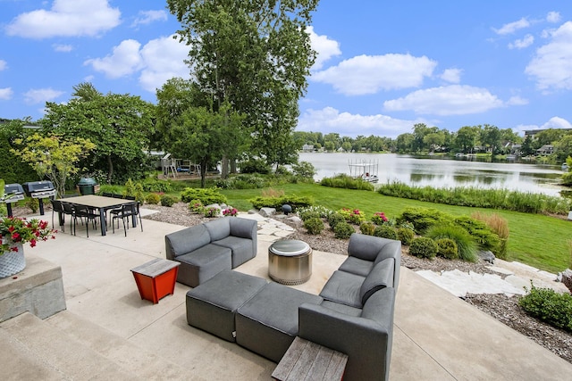 1950 Robinson Rd SE, East Grand Rapids, MI 49506 - view of patio with a water view, an outdoor living space, and outdoor dining space