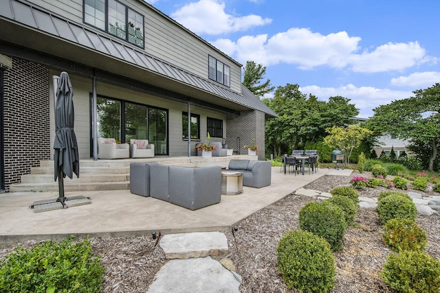 1950 Robinson Rd SE, East Grand Rapids, MI 49506 - view of patio with outdoor lounge area, outdoor dining space, and grilling area
