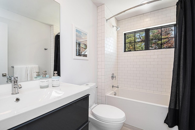 1950 Robinson Rd SE, East Grand Rapids, MI 49506 - bathroom with toilet, shower / bathtub combination with curtain, and vanity