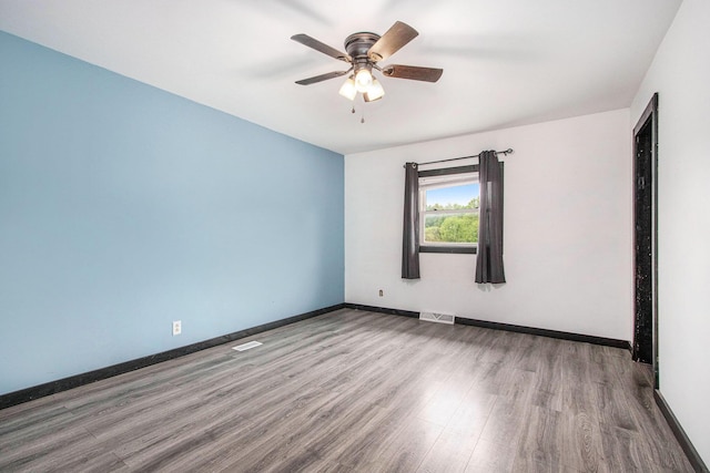 21164 Calvin Hill St, Cassopolis, MI 49031 - spare room with wood finished floors, baseboards, and ceiling fan