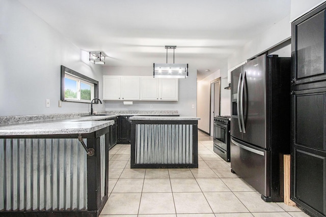 21164 Calvin Hill St, Cassopolis, MI 49031 - kitchen with stainless steel fridge, a sink, range with gas cooktop, light countertops, and light tile patterned flooring