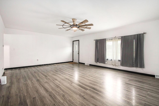 21164 Calvin Hill St, Cassopolis, MI 49031 - spare room with wood finished floors, ceiling fan, and baseboards