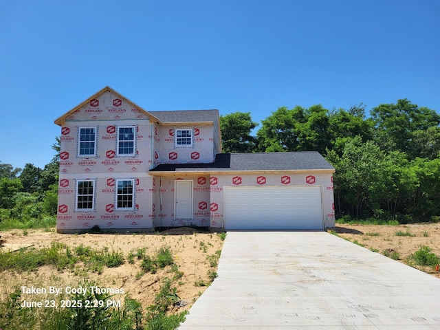 71406 Sophie Rd, Edwardsburg, MI 49112 - view of front facade featuring concrete driveway and a garage