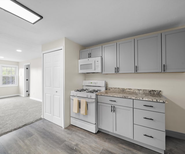 24108 Martinsville Rd, Belleville, MI 48111 - kitchen featuring white appliances, gray cabinets, wood finished floors, and recessed lighting