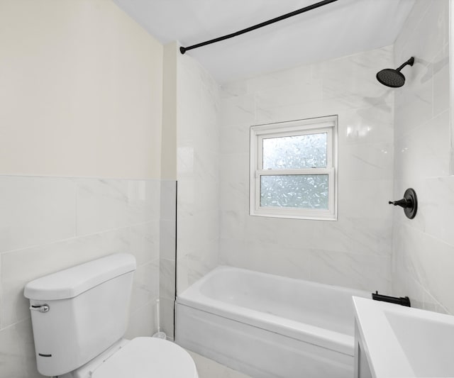 24108 Martinsville Rd, Belleville, MI 48111 - full bathroom featuring tile walls, toilet, and bathing tub / shower combination