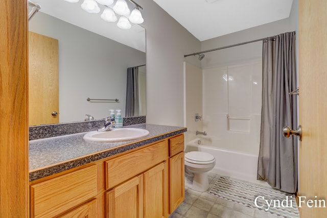 2970 Braden Blvd, Dorr, MI 49323 - bathroom featuring shower / bath combo, toilet, vanity, and tile patterned flooring