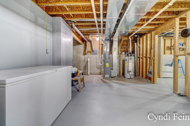 2970 Braden Blvd, Dorr, MI 49323 - unfinished below grade area featuring water heater, white fridge, and heating unit