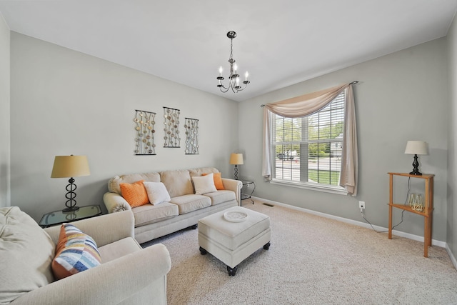 510 Edward J St, Clinton, MI 49236 - living room featuring a chandelier, baseboards, and carpet flooring
