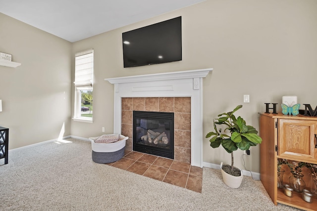 510 Edward J St, Clinton, MI 49236 - carpeted living room featuring a tile fireplace and baseboards