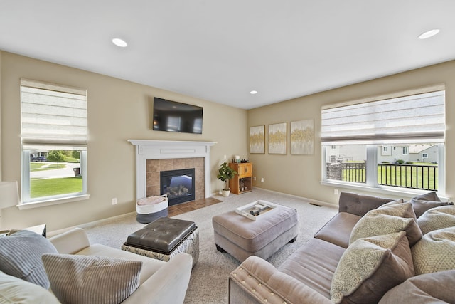 510 Edward J St, Clinton, MI 49236 - living area featuring carpet floors, a tile fireplace, baseboards, and recessed lighting