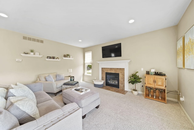 510 Edward J St, Clinton, MI 49236 - carpeted living area featuring a fireplace, baseboards, and recessed lighting