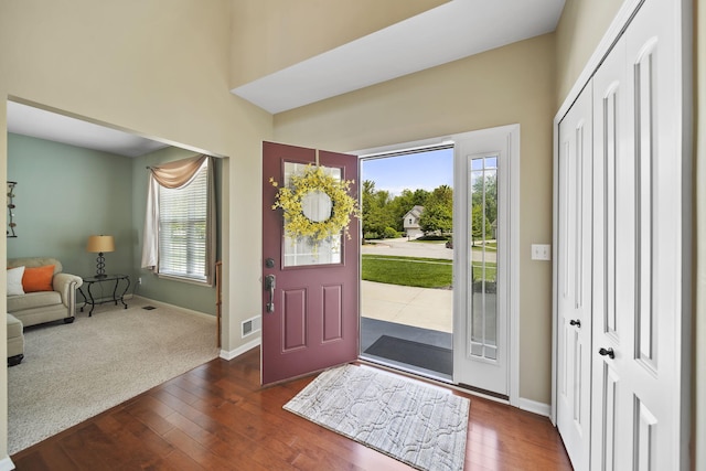 510 Edward J St, Clinton, MI 49236 - foyer featuring dark wood-style flooring and baseboards