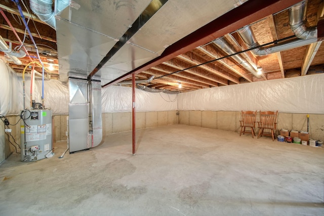 510 Edward J St, Clinton, MI 49236 - unfinished below grade area with gas water heater and heating unit