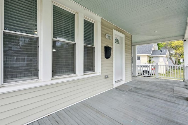 602 Ada Ave, Muskegon, MI 49442 - wooden terrace with covered porch