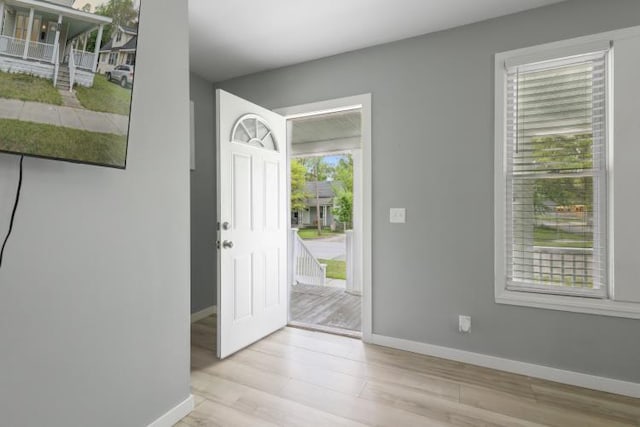 602 Ada Ave, Muskegon, MI 49442 - entryway featuring wood finished floors and baseboards