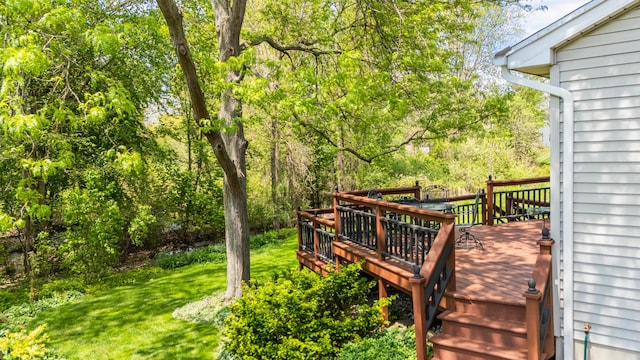 deck featuring a yard