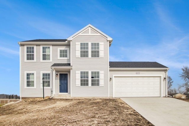 13686 Oasis Ave, Holland, MI 49424 - view of front of home with a garage and driveway