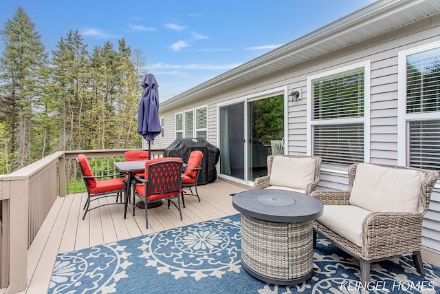 12745 Riverton Rd, Grand Haven, MI 49417 - deck with outdoor dining space