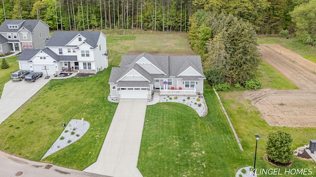 12745 Riverton Rd, Grand Haven, MI 49417 - aerial view of property and surrounding area featuring a heavily wooded area