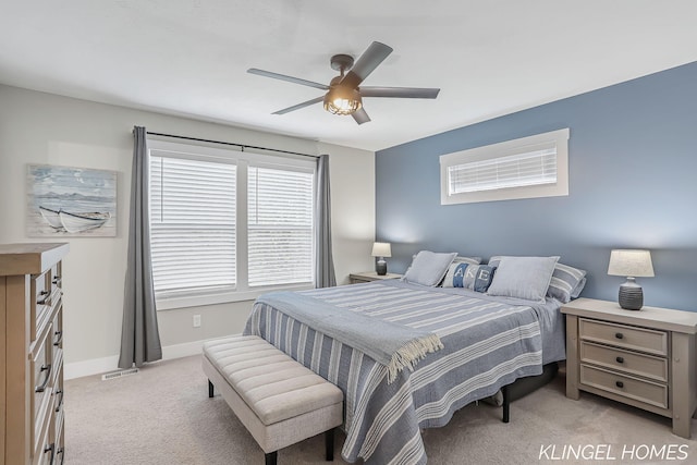 12745 Riverton Rd, Grand Haven, MI 49417 - bedroom featuring light carpet, baseboards, and ceiling fan