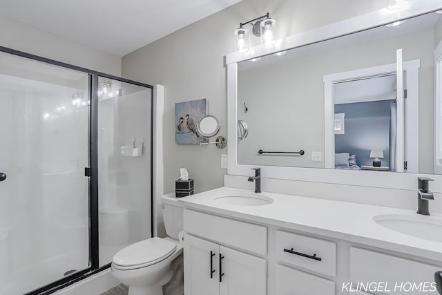 12745 Riverton Rd, Grand Haven, MI 49417 - full bath featuring ensuite bath, a shower stall, double vanity, and toilet