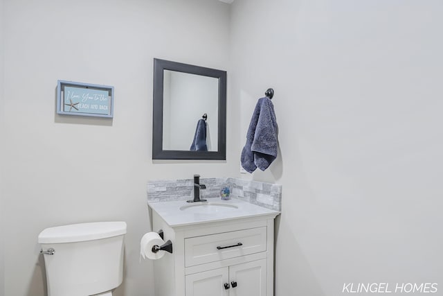 12745 Riverton Rd, Grand Haven, MI 49417 - half bath with vanity and toilet