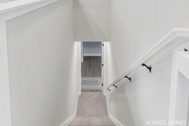 12745 Riverton Rd, Grand Haven, MI 49417 - stairs featuring baseboards and carpet