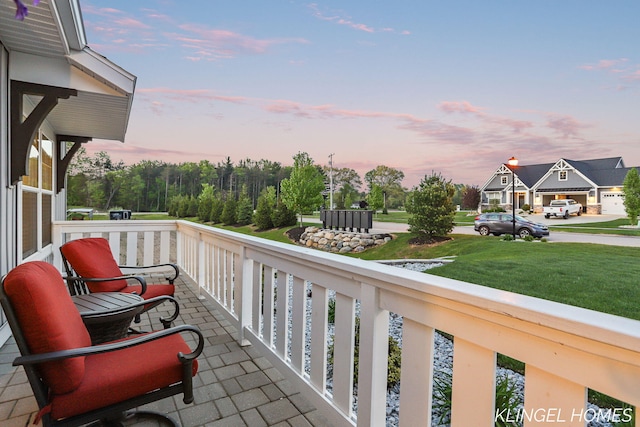 12745 Riverton Rd, Grand Haven, MI 49417 - view of balcony at dusk