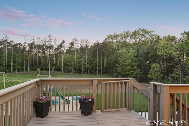 12745 Riverton Rd, Grand Haven, MI 49417 - wooden deck featuring a wooded view