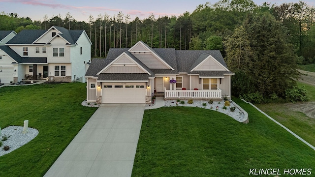 12745 Riverton Rd, Grand Haven, MI 49417 - craftsman inspired home with board and batten siding, a garage, a porch, and a front yard
