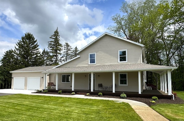 928 Lincoln St, Grand Rapids, MI 49534 - farmhouse featuring covered porch, concrete driveway, a garage, and a front yard