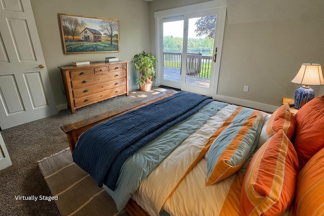 928 Lincoln St, Grand Rapids, MI 49534 - bedroom featuring carpet floors, access to exterior, and baseboards