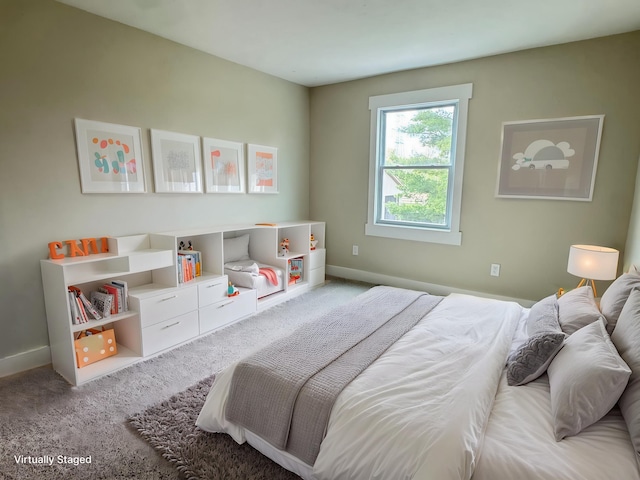 928 Lincoln St, Grand Rapids, MI 49534 - bedroom with baseboards and carpet