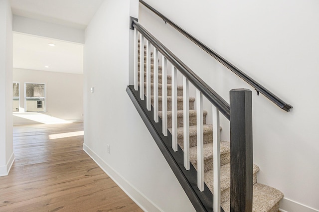 6182 Longhorn Trl, Stevensville, MI 49127 - staircase featuring wood finished floors and recessed lighting