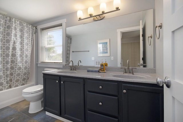 2177 S Lakeshore Dr, Ludington, MI 49431 - bathroom with double vanity, toilet, and shower / tub combo